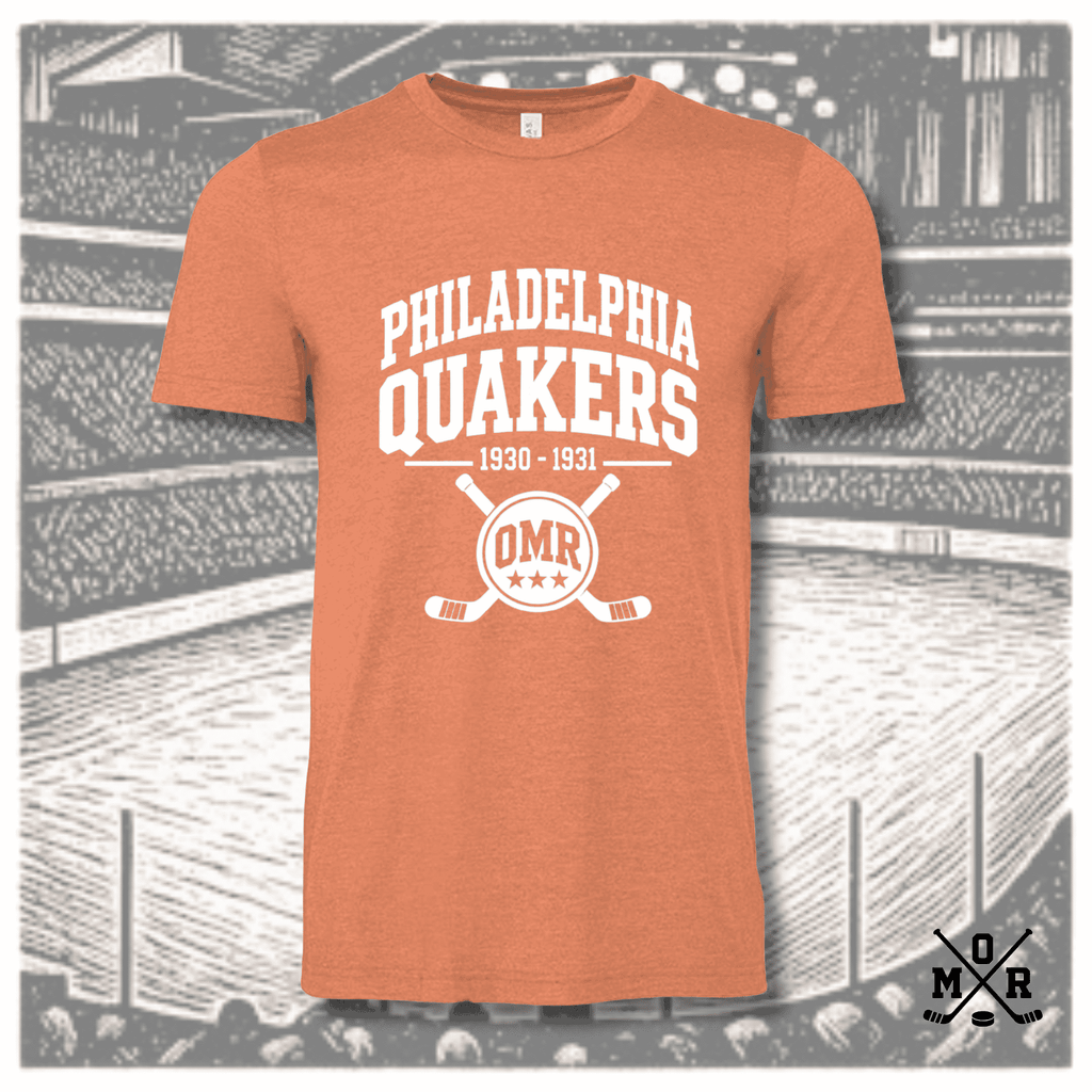 Heathered orange vintage hockey t-shirt with Philadelphia Quakers 1930-1931 text and crossed sticks crest