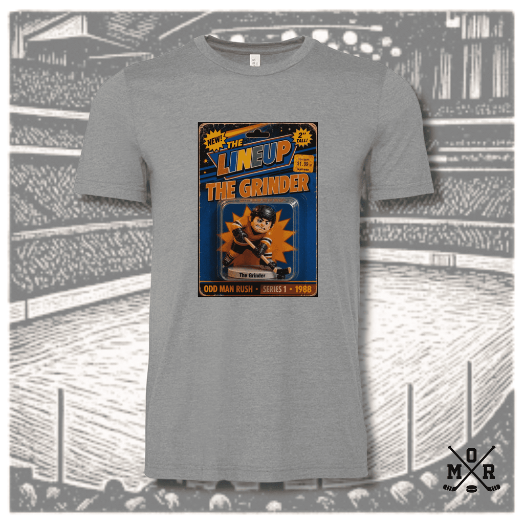 Heather grey crew neck The Grinder retro hockey t-shirt featuring full-color DTF transfer of vintage toy package graphic