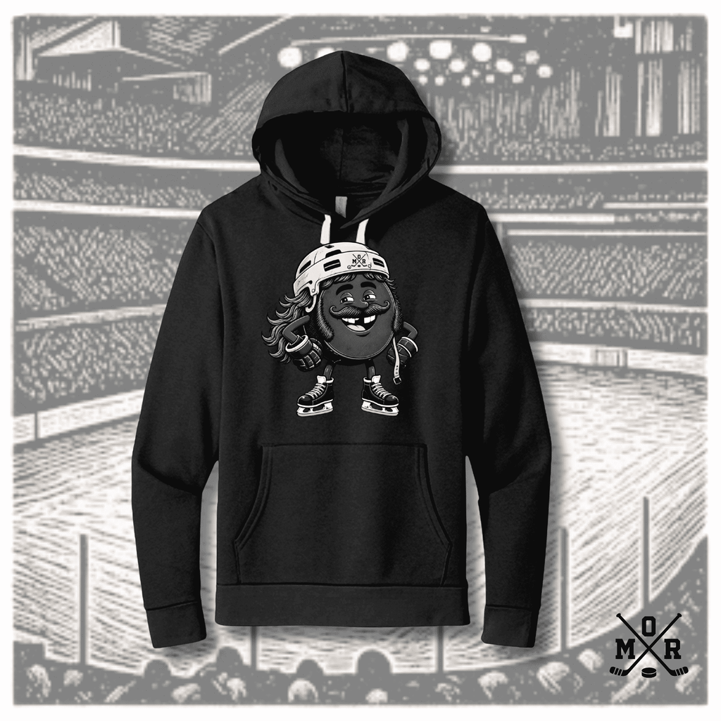 Black vintage hockey hoodie with white drawstrings and front kangaroo pocket featuring a centered graphic of an anthropomorphic black hockey puck character wearing a white helmet, ice skates, and glov