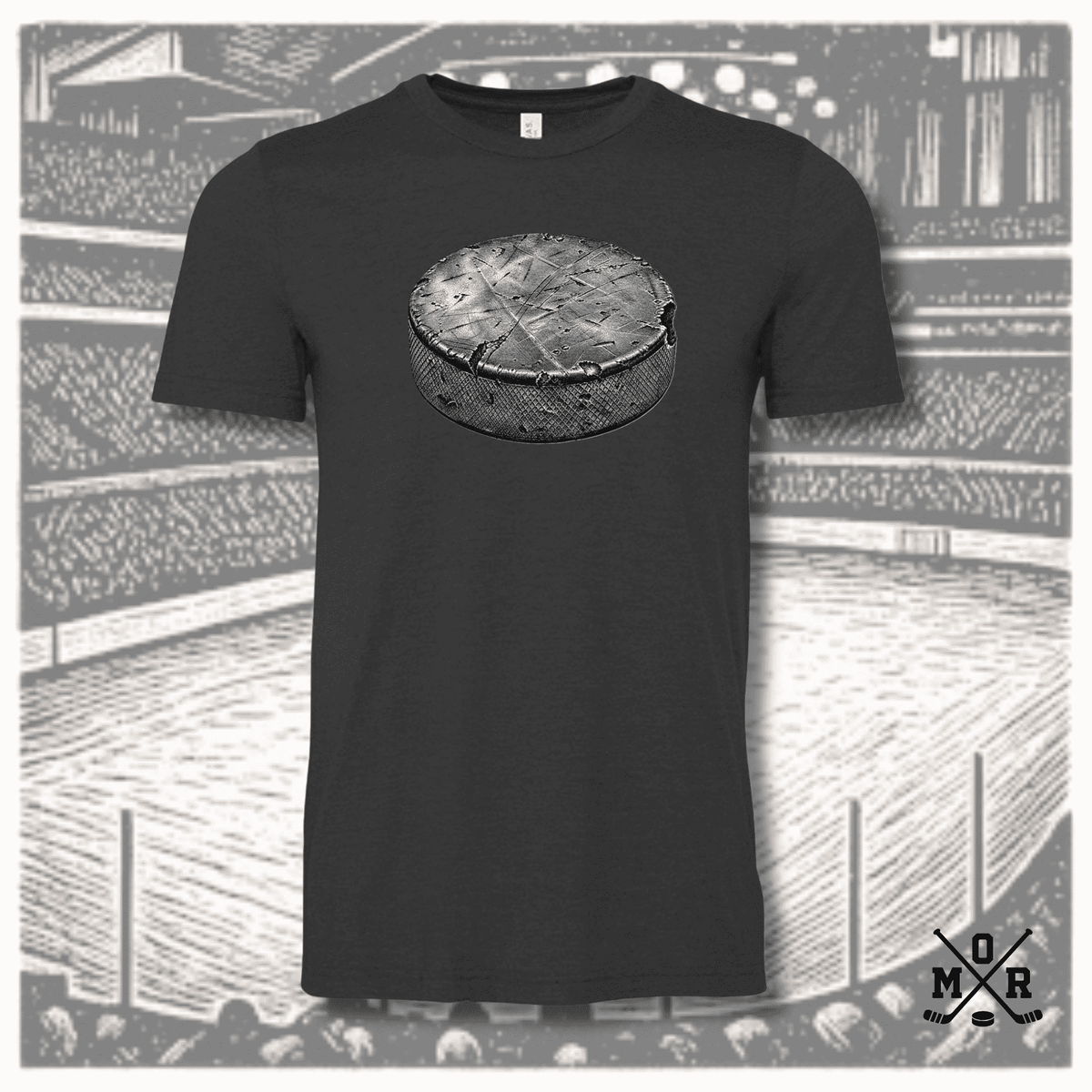 Charcoal grey unisex T-shirt featuring distressed vintage hockey puck graphic and faded arena background